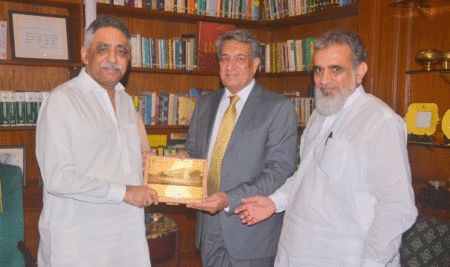 TIP Management Presenting Shield to Governor Sindh Mr. Mohammad Zubair at Governor House